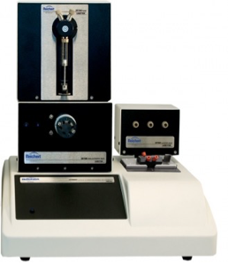 White laboratory instrument with two stacked black modules and control knobs, used for sample analysis