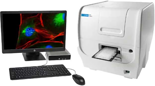 A laboratory imaging system with a computer monitor, keyboard, and mouse connected to an analyzer holding a microplate; the monitor displays fluorescent cell images