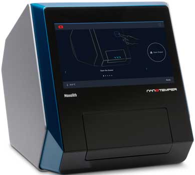 A Monolith instrument by NanoTemper Technologies with a touch screen display showing operational instructions. The device has a black and metallic blue exterior and is used for molecular interaction analysis in laboratory research.